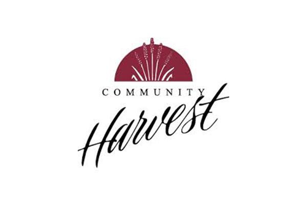 Logo for Community Harvest: maroon semi-circle above the word 