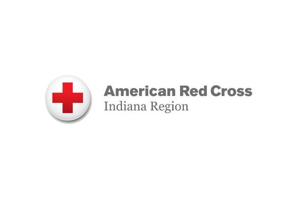 American Red Cross logo: Red cross inside a white circle, with text 