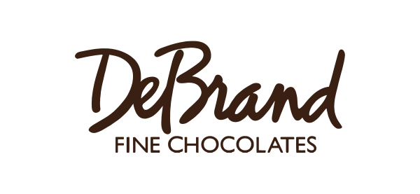 DeBrand Fine Chocolates logo in dark brown script. "DeBrand" above "FINE CHOCOLATES".