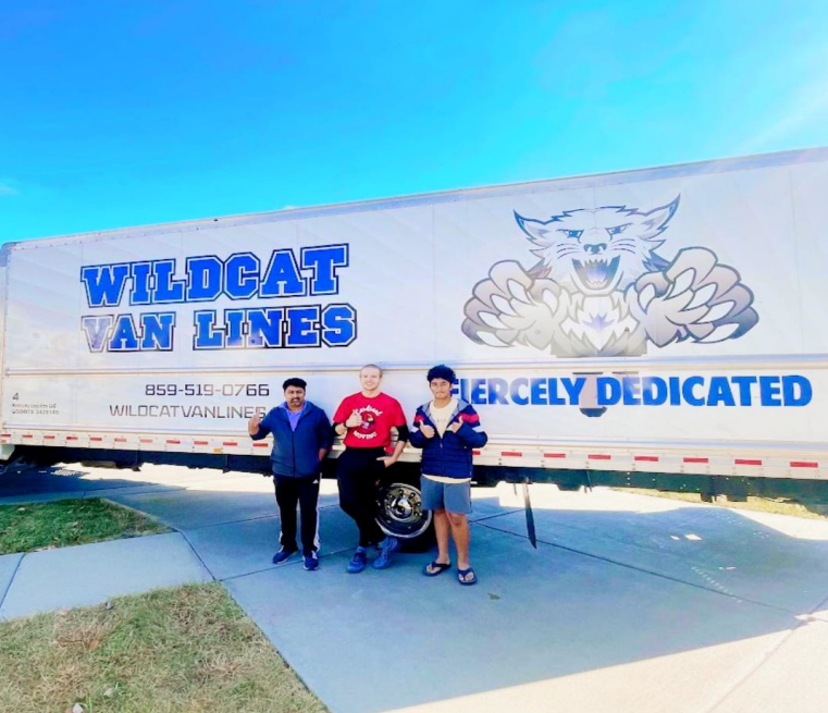 Three People Standing Beside the Truck - Lexington, KY - Wildcat Moving