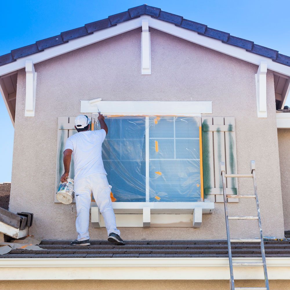 Man Painting the Window Frame — Chico, CA — Joe Shaw Painting