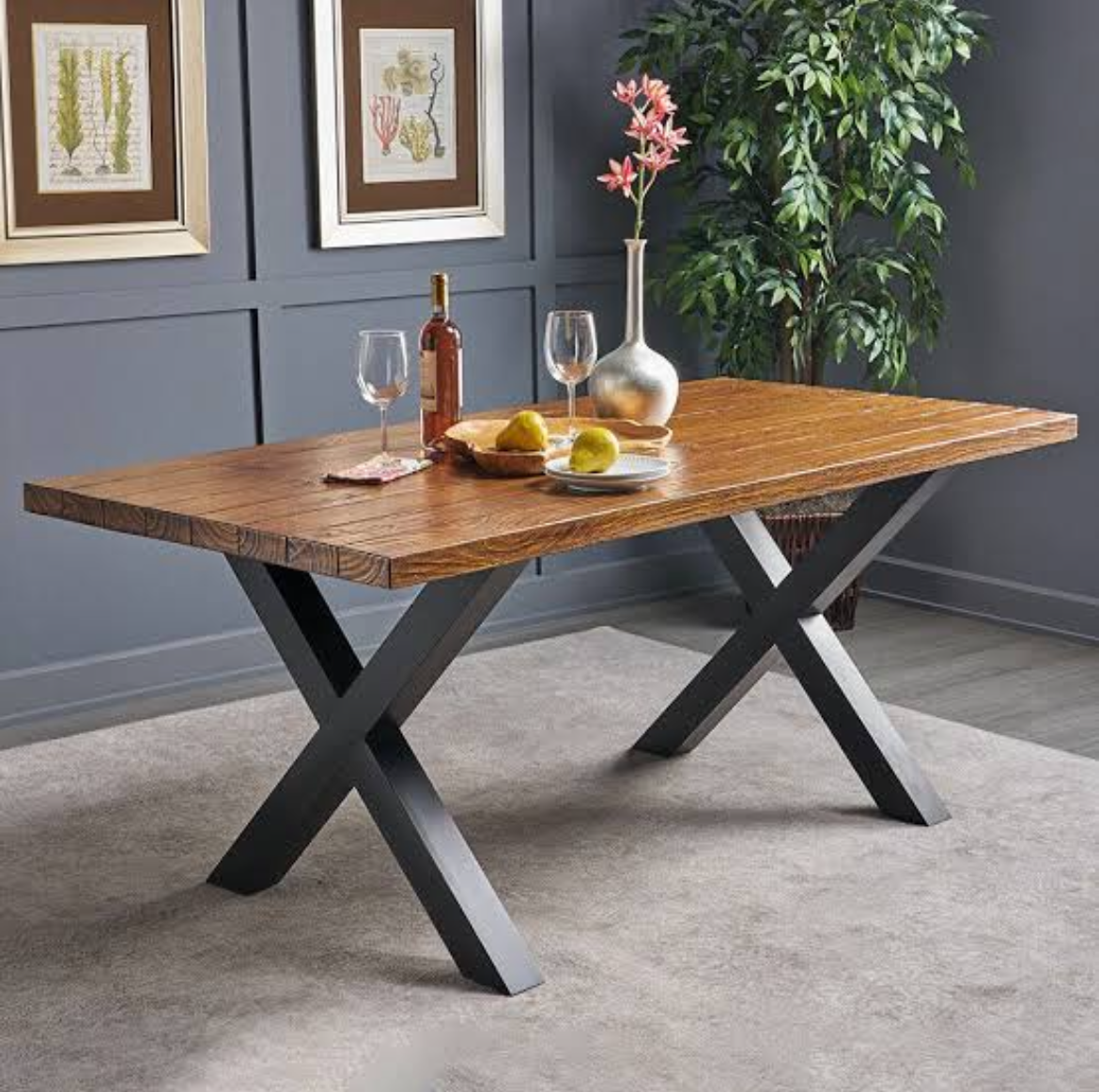 Wooden deck with screened enclosure overlooking a backyard with a pool.