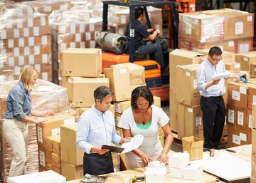 Workers in warehouse processing orders