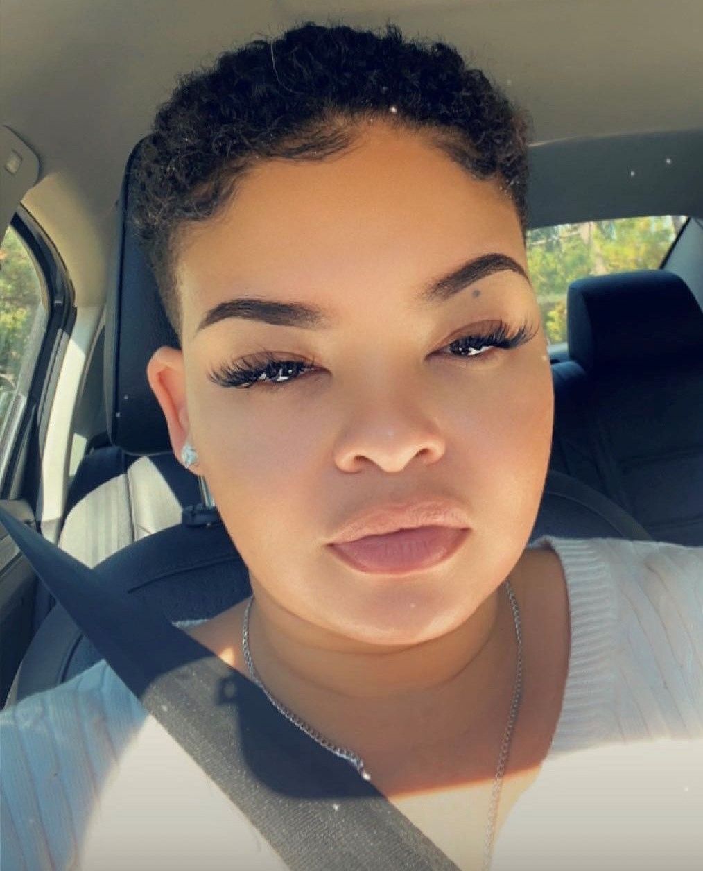 It is a silhouette of a person without a face.