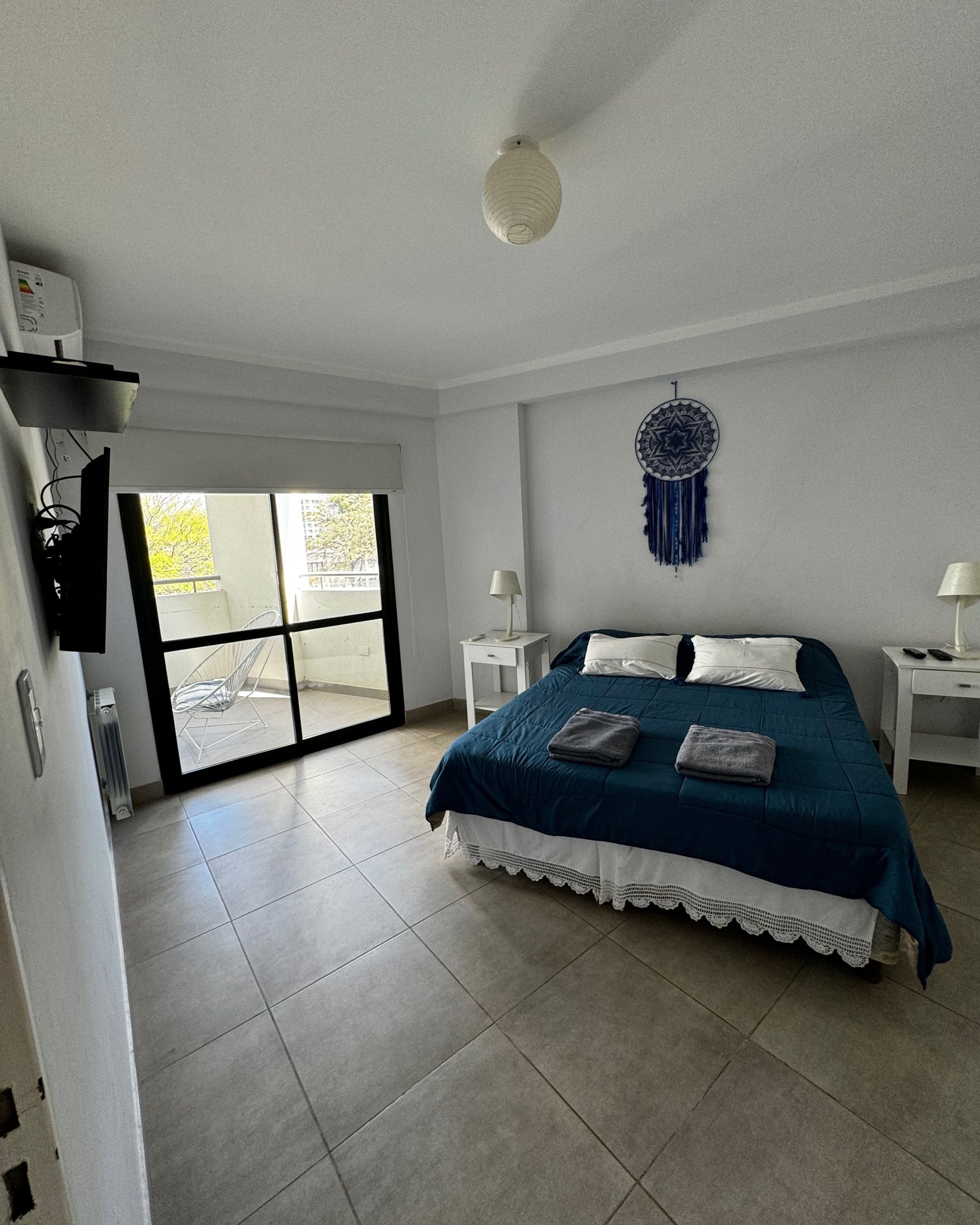 There is a large bed in the middle of the room.