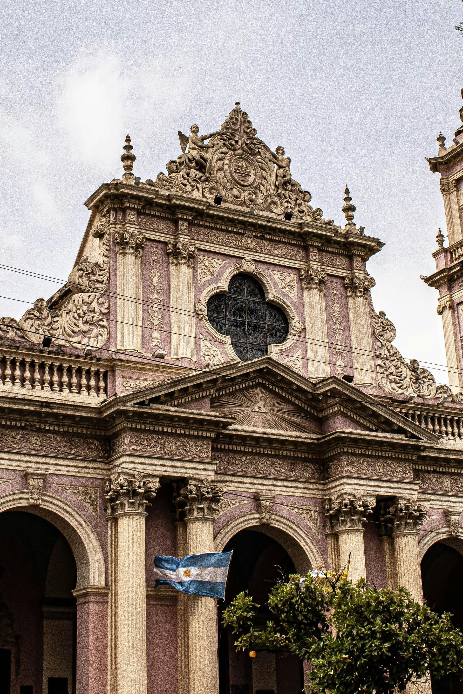 A large building with a flag flying in front of it