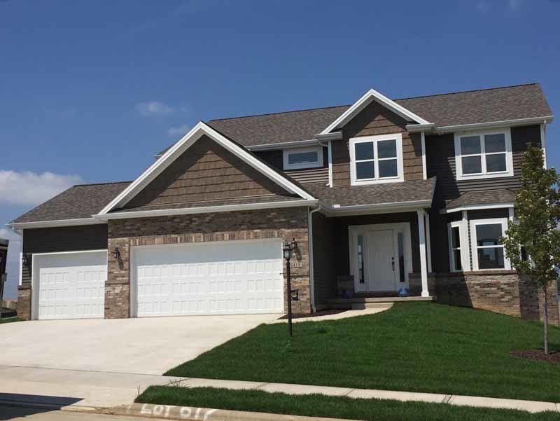 residential home with two garage doors