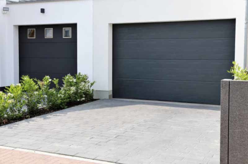 modern home with black garage door