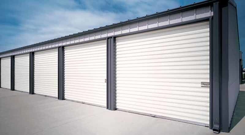 five white garage doors