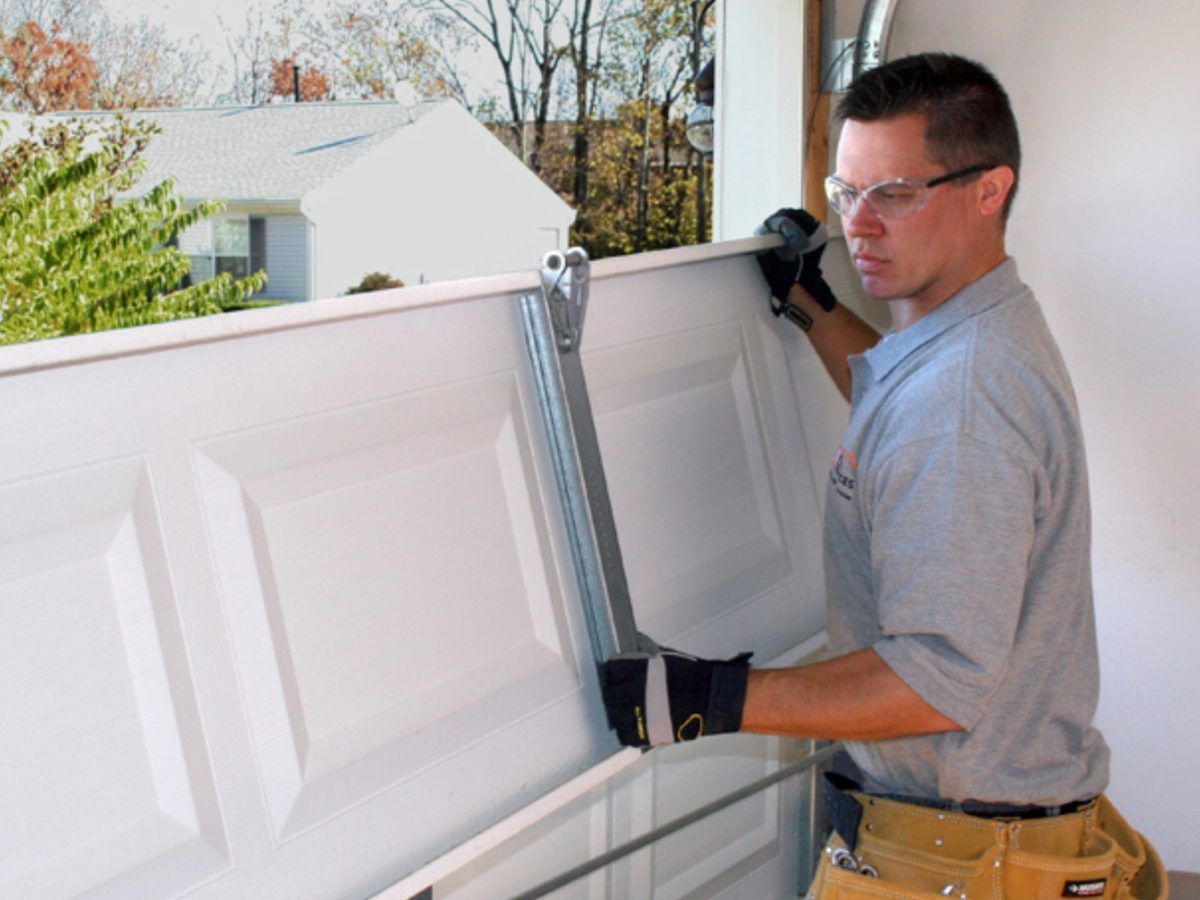Garage door installation by professional technician