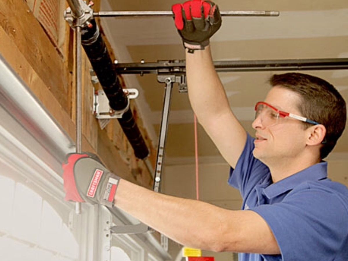 Garage door spring replacement by professional technician