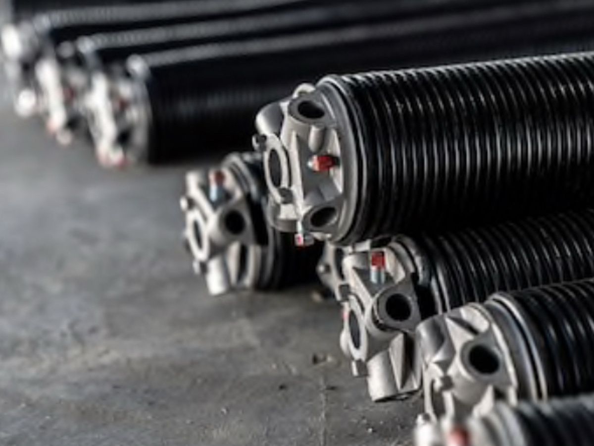 High cycle garage door torsion springs in different sizes used for residential garage door systems