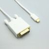 A close up of a white cable on a table.