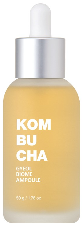 一瓶帶滴管的康普茶臉部安瓿，裡面有黃色液體。