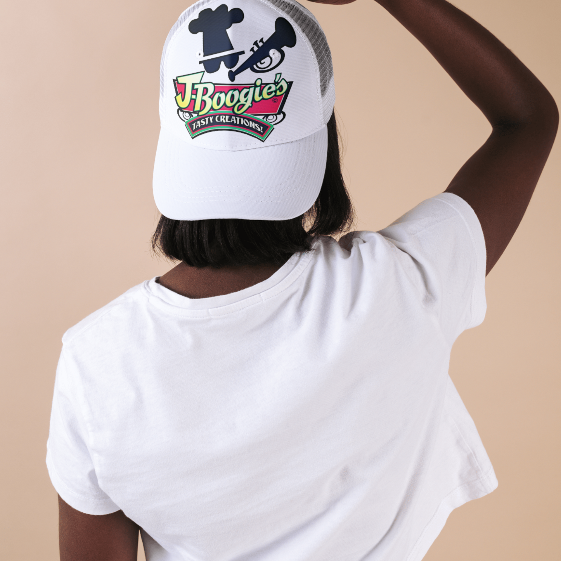 J-Boogie’s Tasty Creations branded merchandise, including hats and t-shirts, available for BBQ enthusiasts.