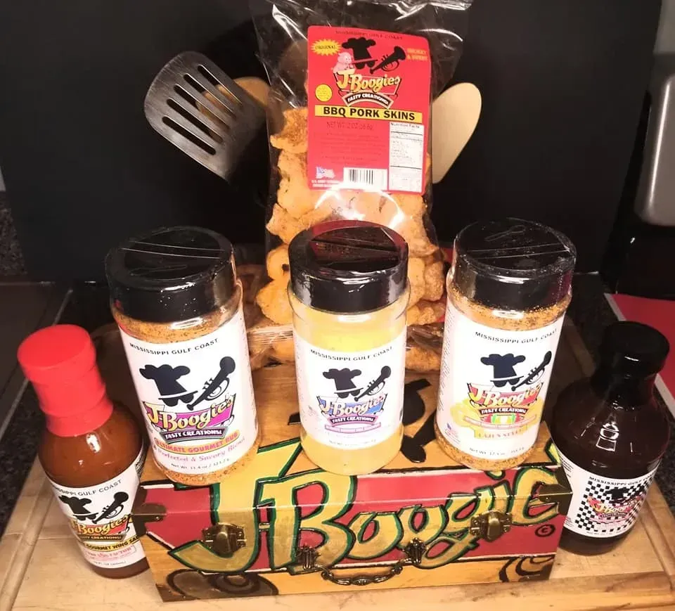 J-Boogie’s BBQ products displayed for sale in local stores.