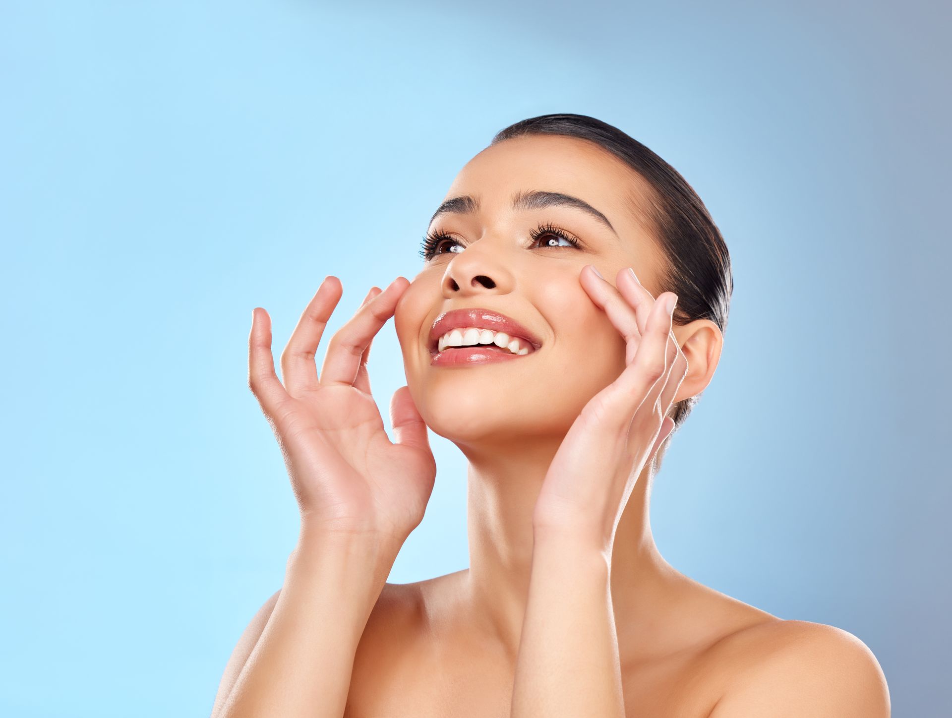 A woman with radiant, even-toned skin after sequencing a VI Peel and Glo2Facial near Lexington, Kent
