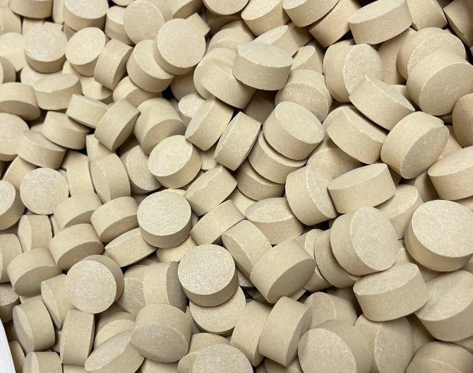 A pile of pills are stacked on top of each other