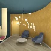 A curved, mustard-yellow wall with a leaf pattern and 