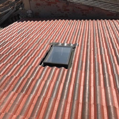 instalación de claraboya en tejado de tejas en Coslada, Madrid