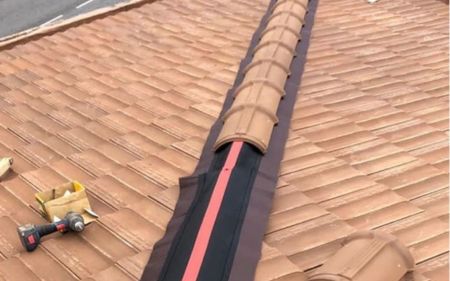 reparación de limas en tejado de tejas con filtraciones en Coslada, Madrid