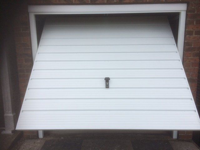 White canopy and retractable door