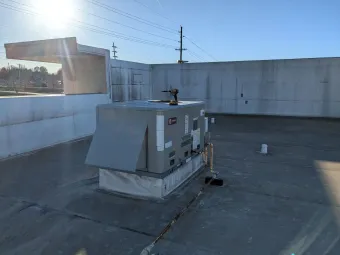 Dirty air filter inside an HVAC unit.