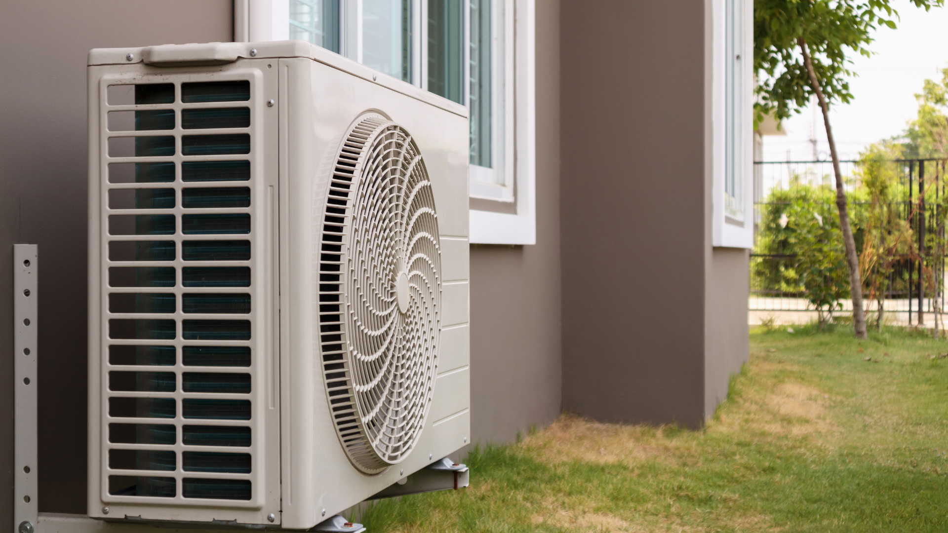 A dirty HVAC filter, 20x30x1 size, inside an air handler.