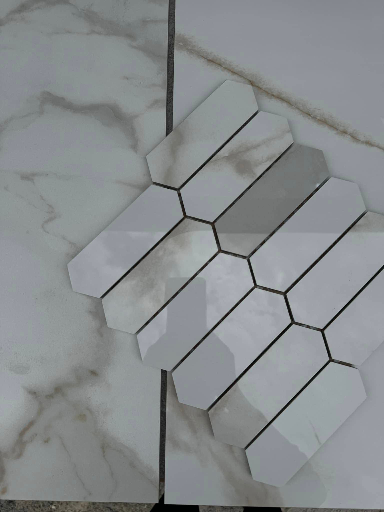 A Smaller Section Of Tiles On Top Of Bigger Marble Tiles — Smart Tiles In South Kempsey, NSW