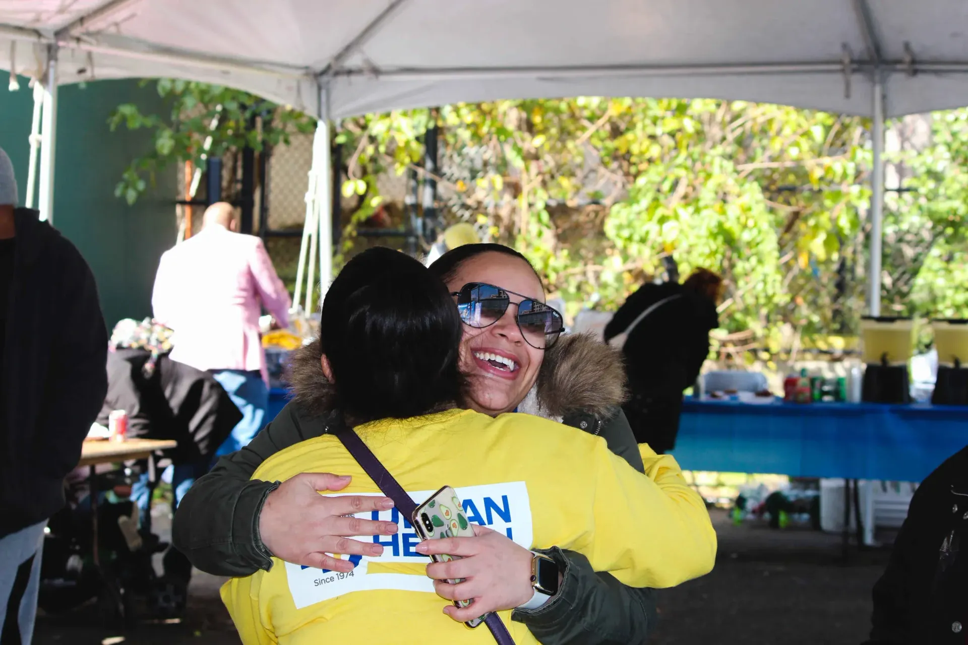 A brick chimney on top of a metal roof