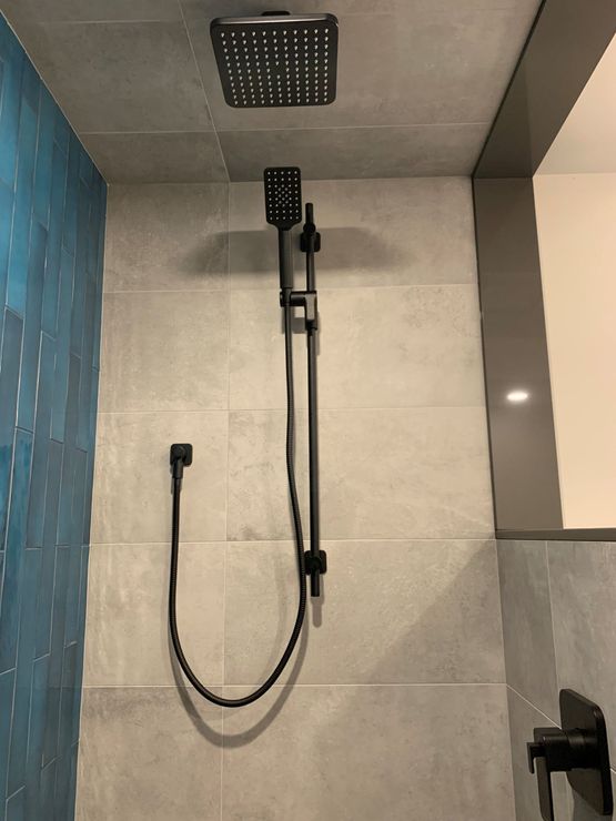 2' x 2' grey tile bathroom