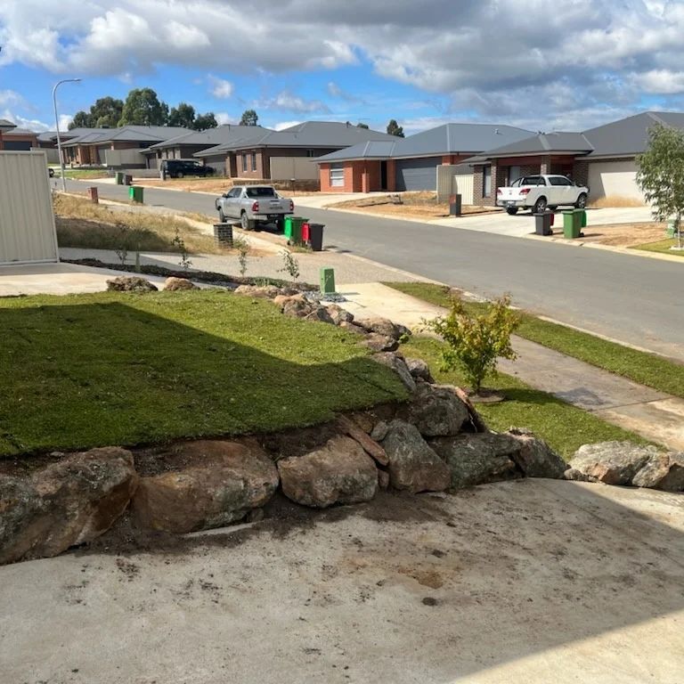 A White Truck Is Parked On The Side Of The Road In A Residential Area — Grants Excavations In Osbornes Flat, VIC