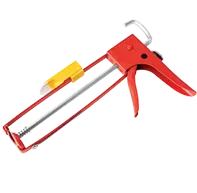 A red metal caulking gun with a yellow trigger guard and a silver plunger rod on a white background.