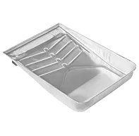 A silver metal paint tray with a ridged ramp for roller loading.