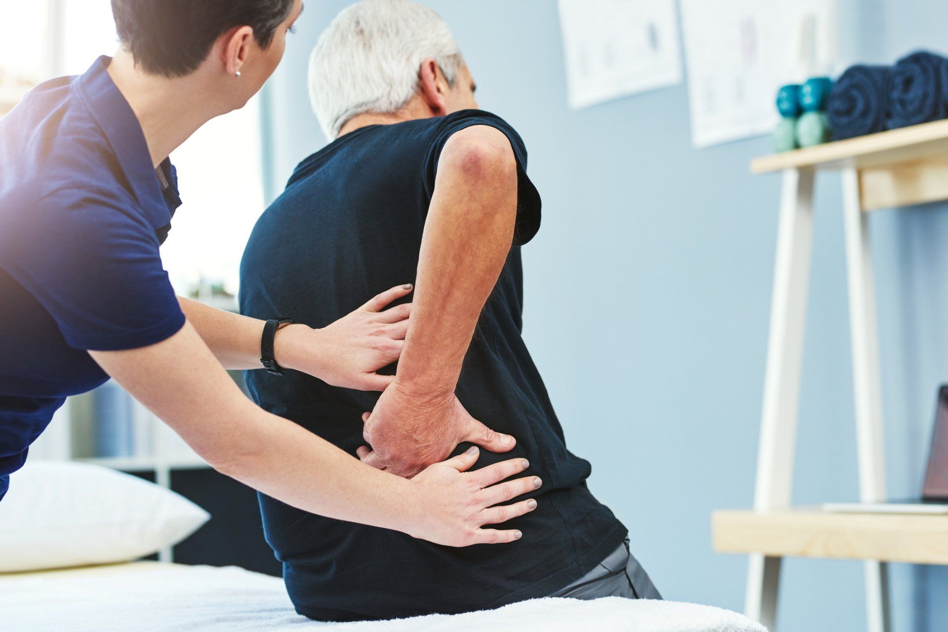 Physiotherapist Assisting A Senior Patient — Crossville, TN — Newton Chiropractic Clinic