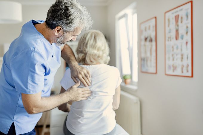Examining A Senior Patient With Back Pain — Crossville, TN — Newton Chiropractic Clinic