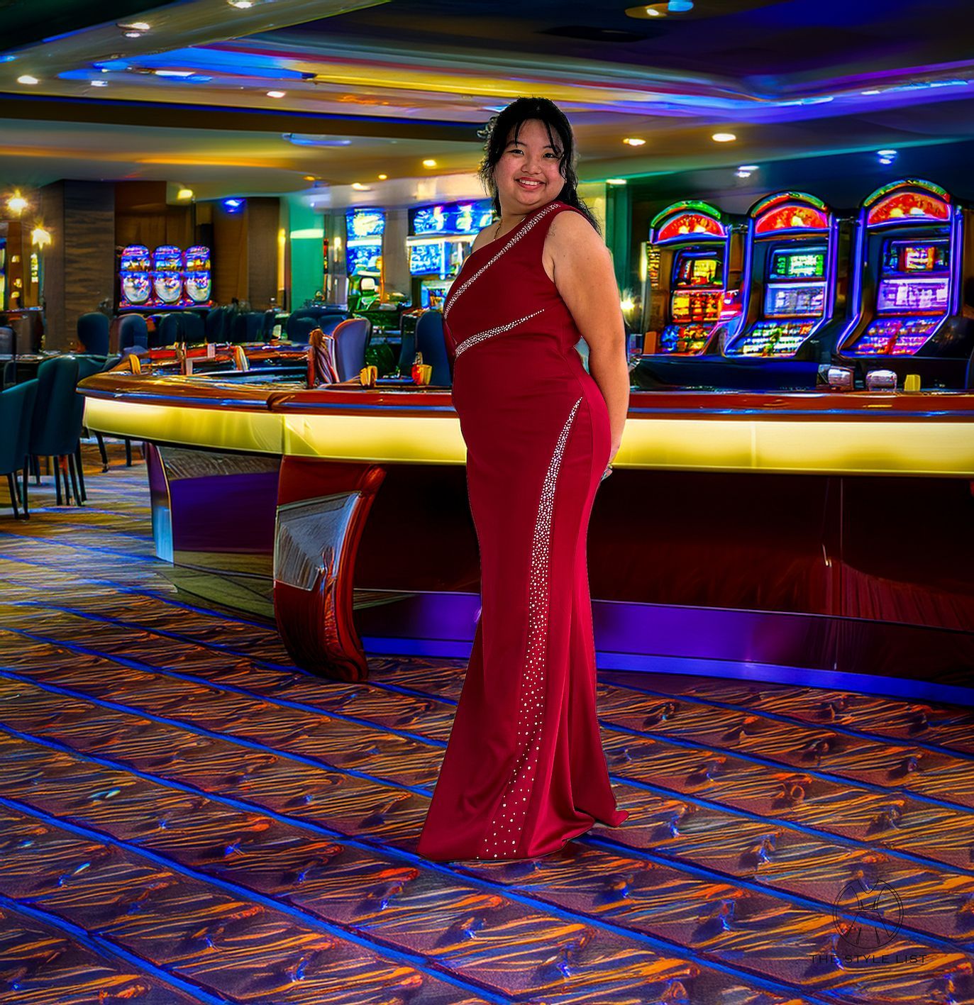 A woman in a red dress is standing in a casino