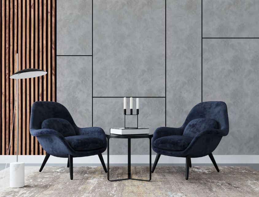 There are two chairs and a table in the room.