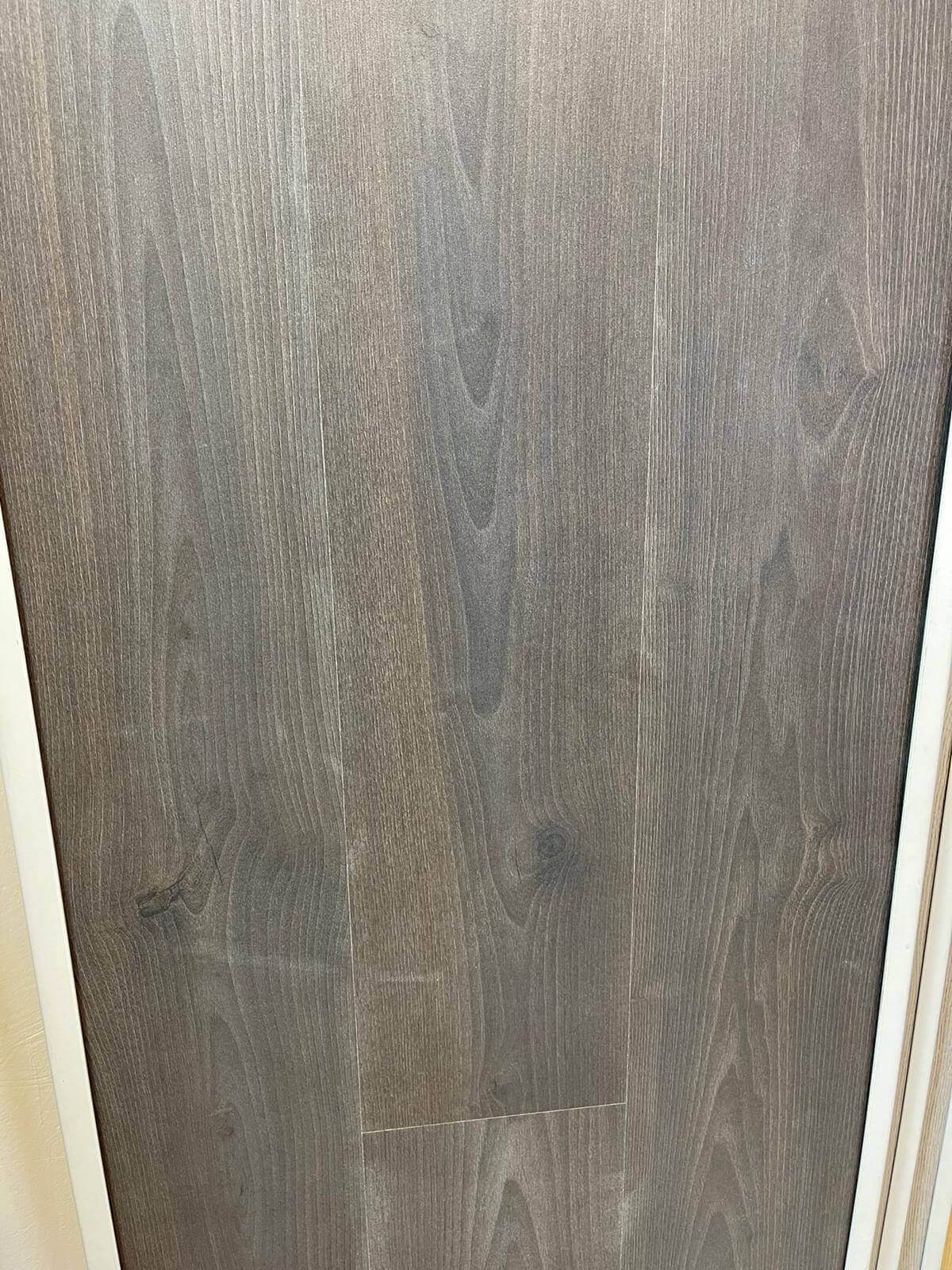 A close up of a piece of wood with a hole in it.