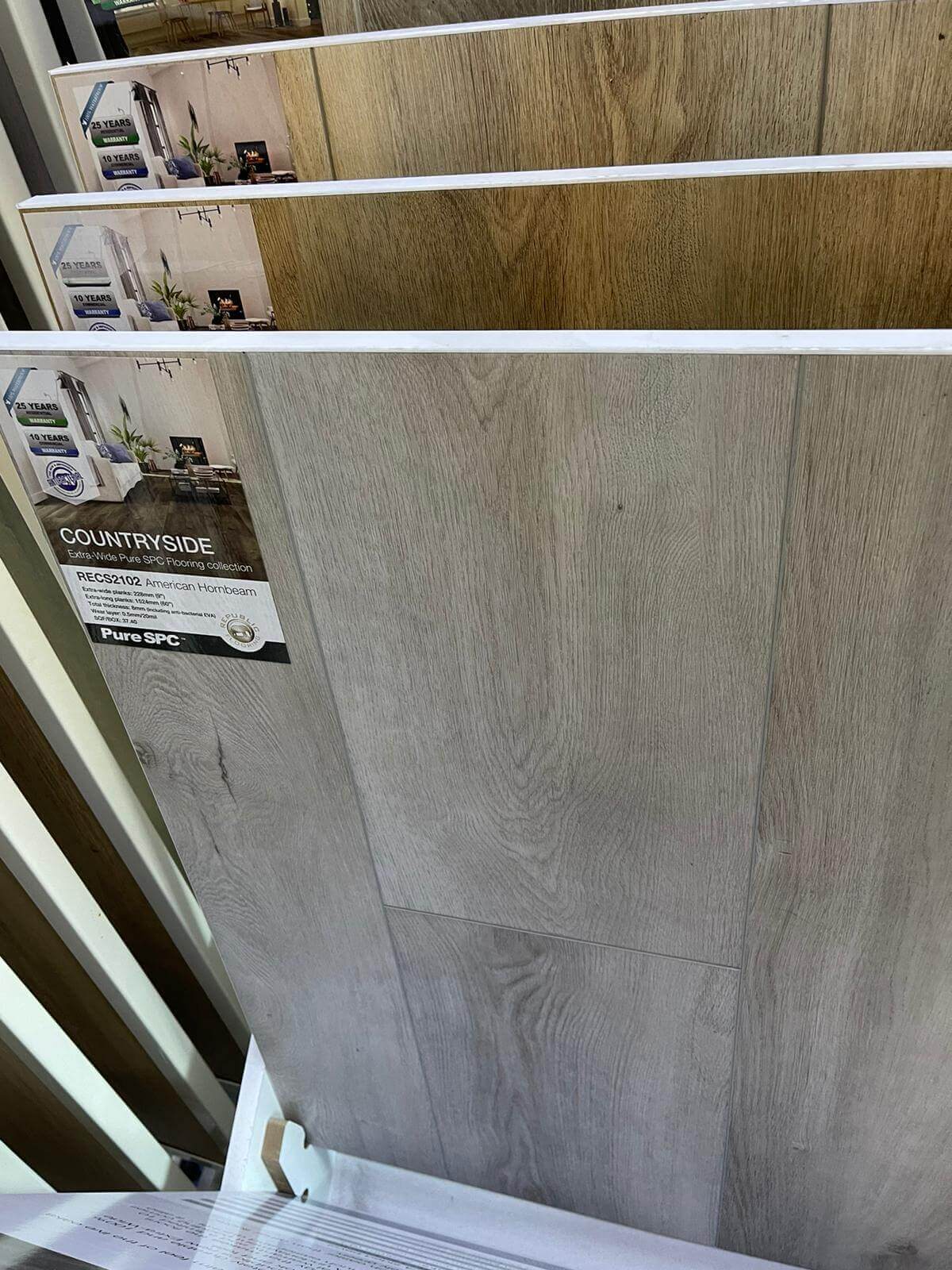 A close up of a wooden floor in a store.