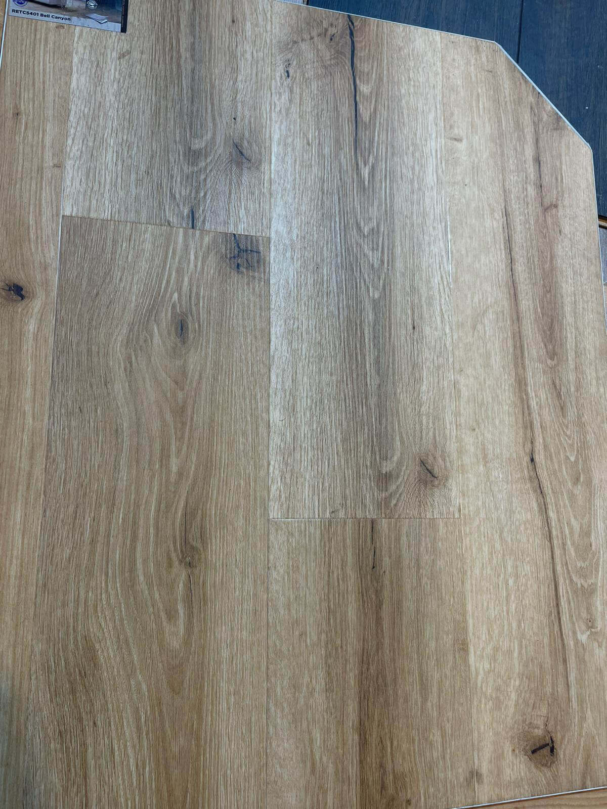 A close up of a piece of wood on a table.