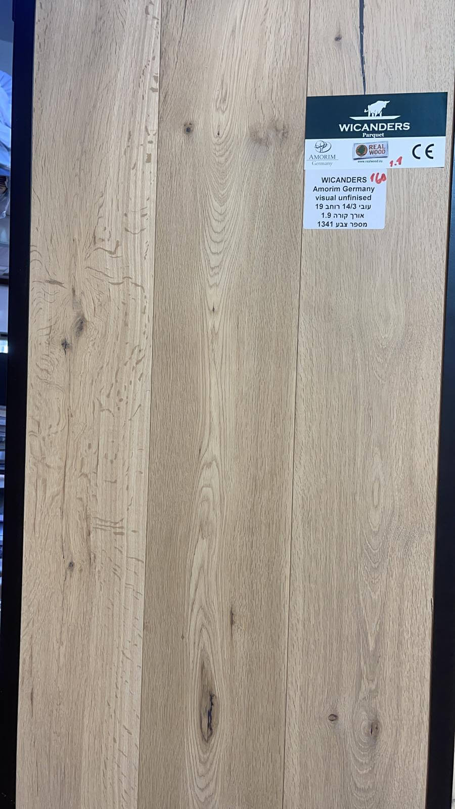 A close up of a piece of wood with a label on it.