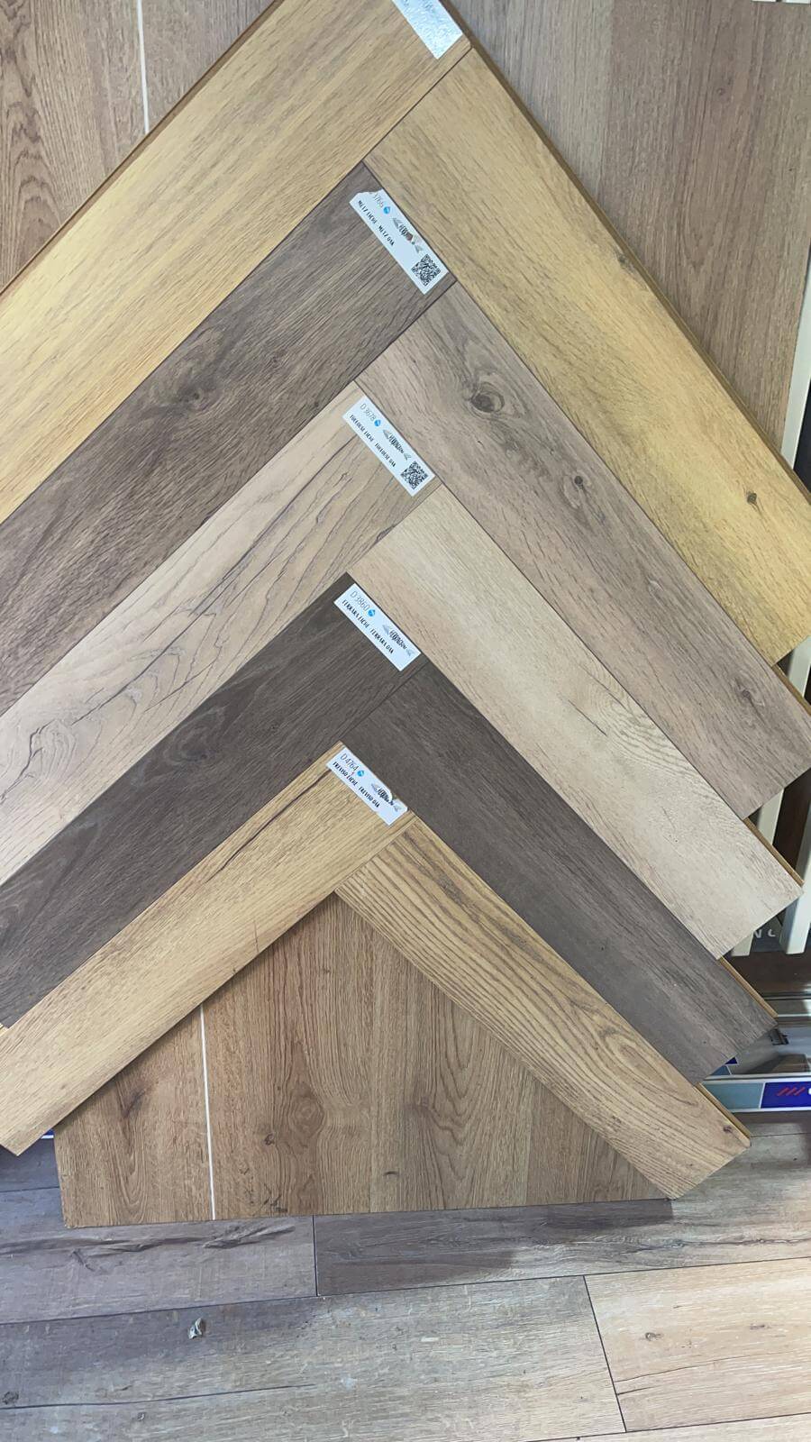 A bunch of wooden boards are stacked on top of each other.