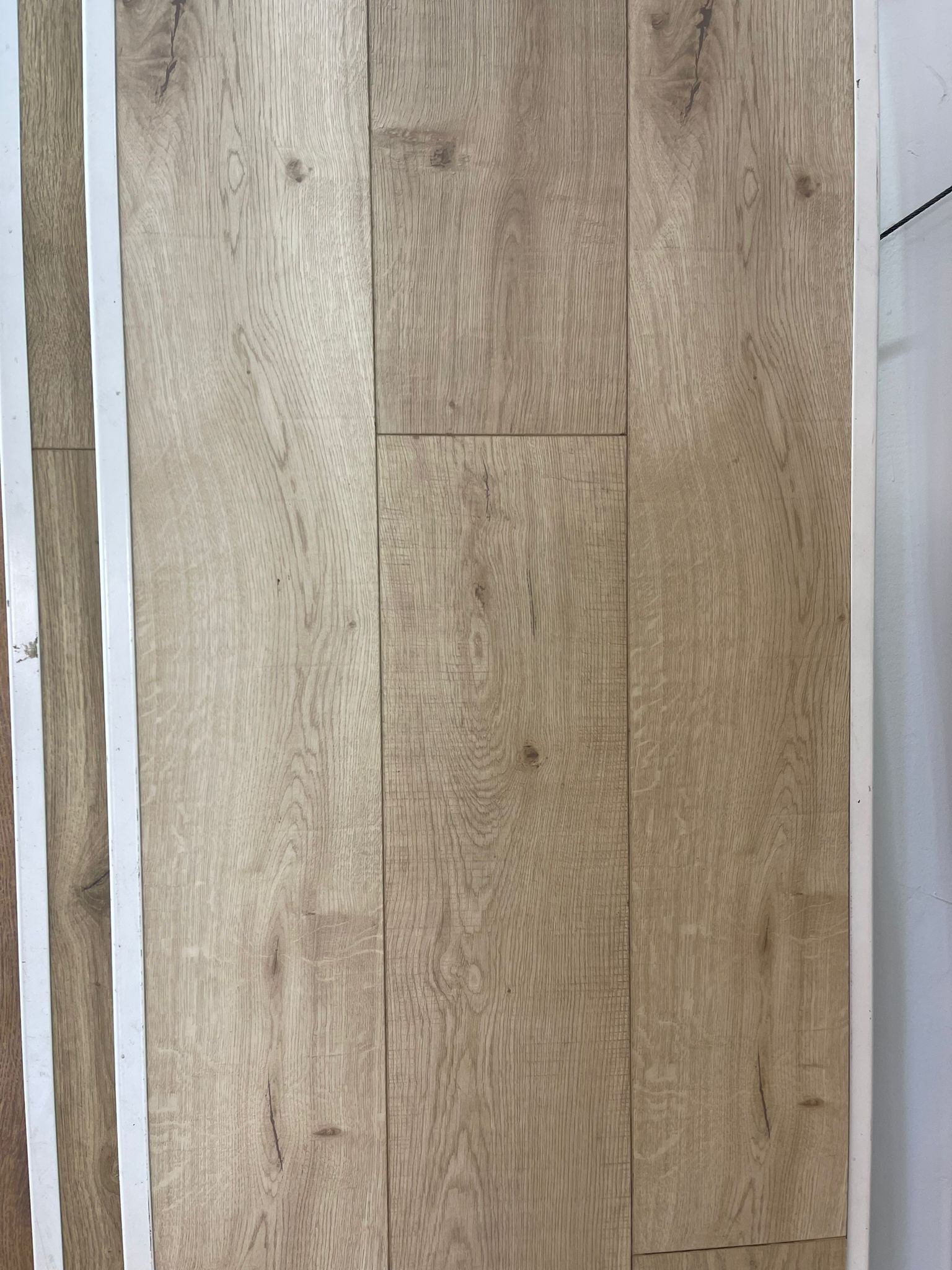 A close up of a piece of wood sitting on top of a table.