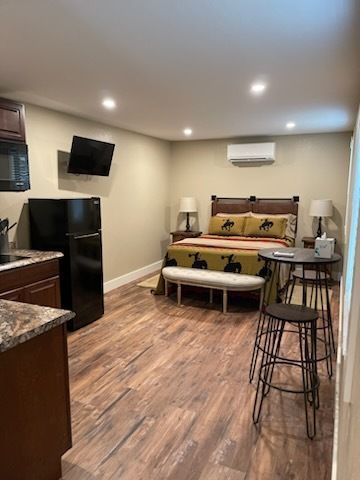 There is a large bed in the middle of the room.