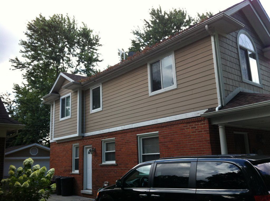 House Gutters — Southfield, MI — Henderson’s Gutter Cleaning Service