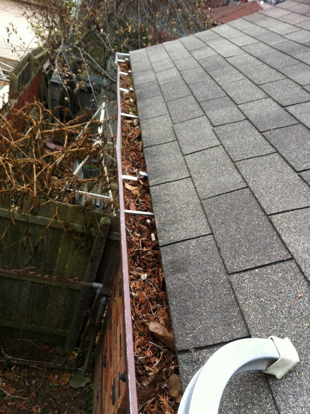 Buildup Of Debris — Southfield, MI — Henderson’s Gutter Cleaning Service