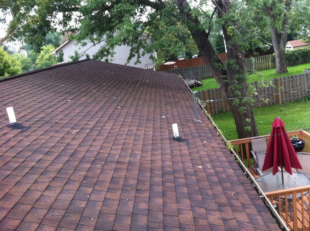 Roof And Gutter Debris — Southfield, MI — Henderson’s Gutter Cleaning Service