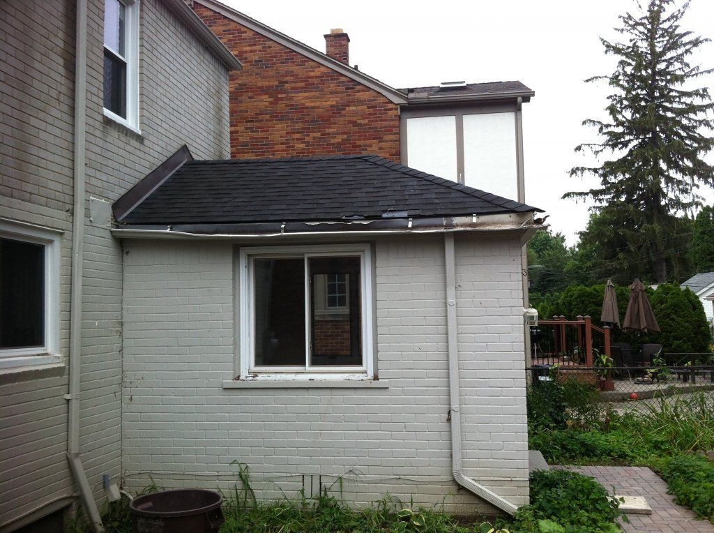 Before Rear Gutter Repairs — Southfield, MI — Henderson’s Gutter Cleaning Service