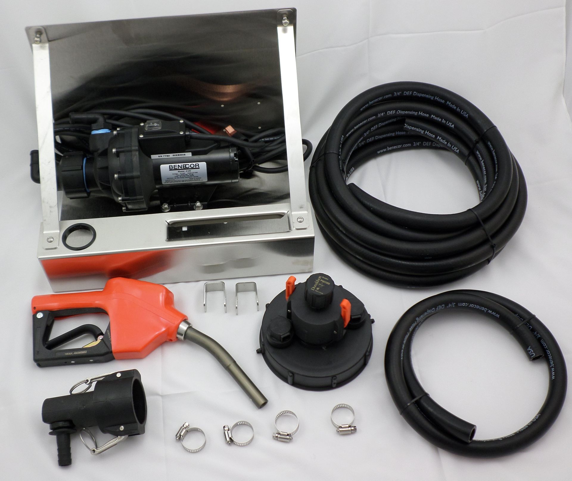 Fuel transfer pump kit with nozzle, hoses, and other components.
